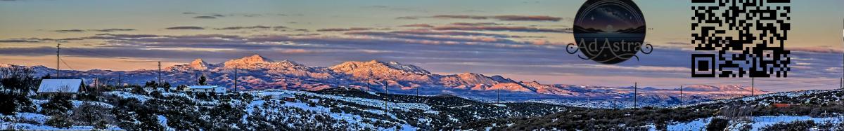 Radiance of Dawn Over Snow-Capped Horizons